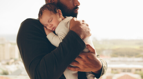 Father Carrying Child